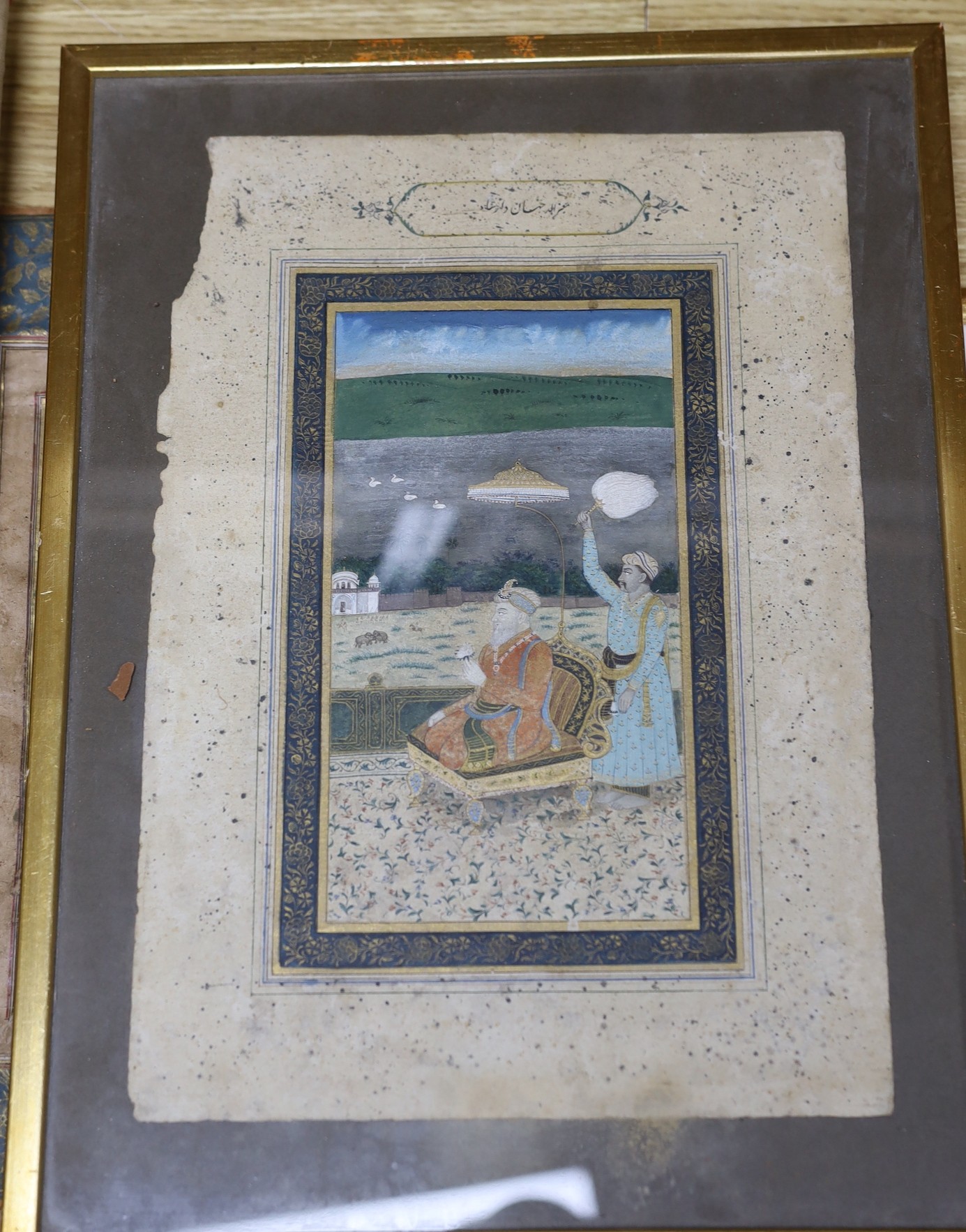An Indian painted silk panel, two framed Persian paintings and another unframed painting.